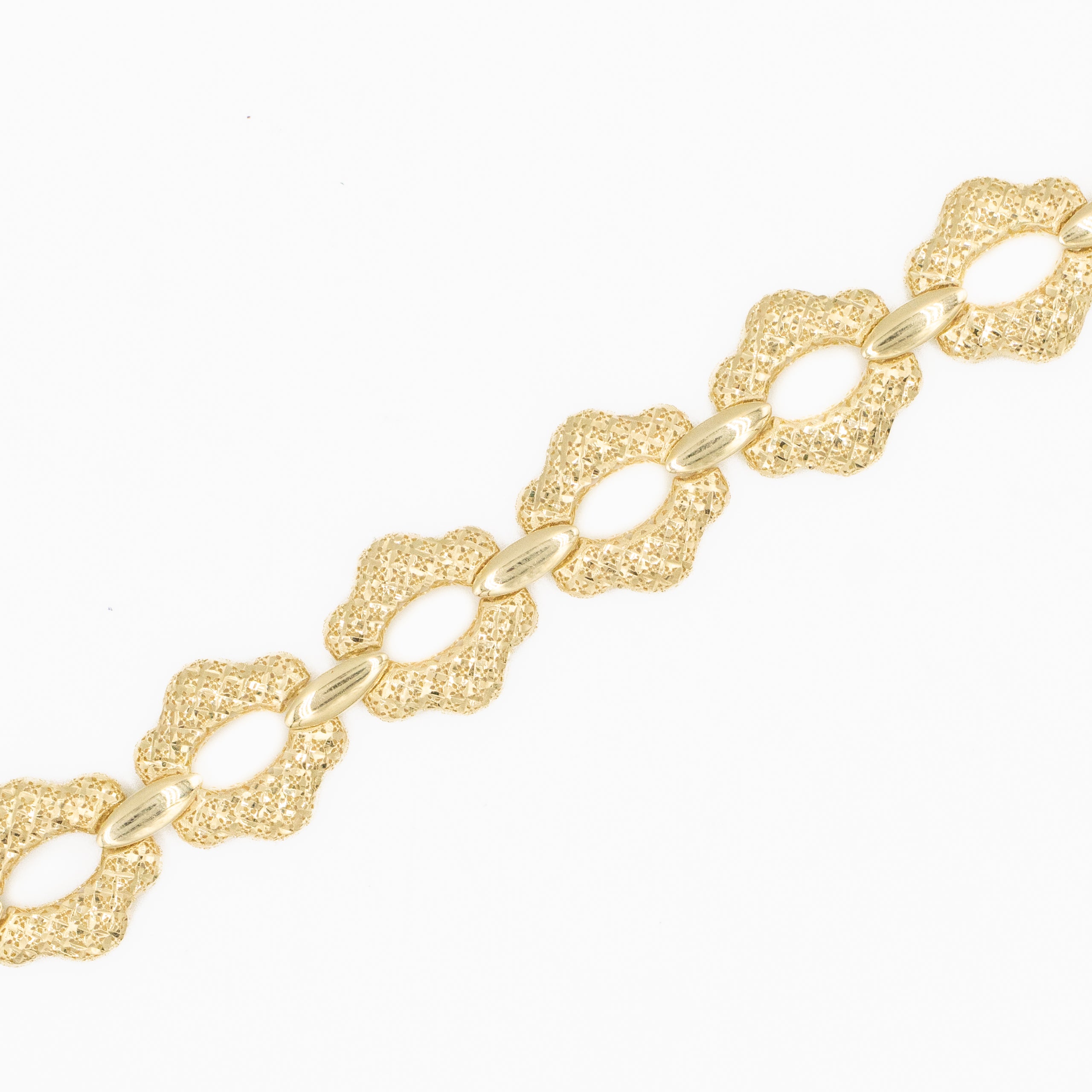 PULSERA MONACO TEJIDO FLOR DIAMANTADA HUECO ORO 14K