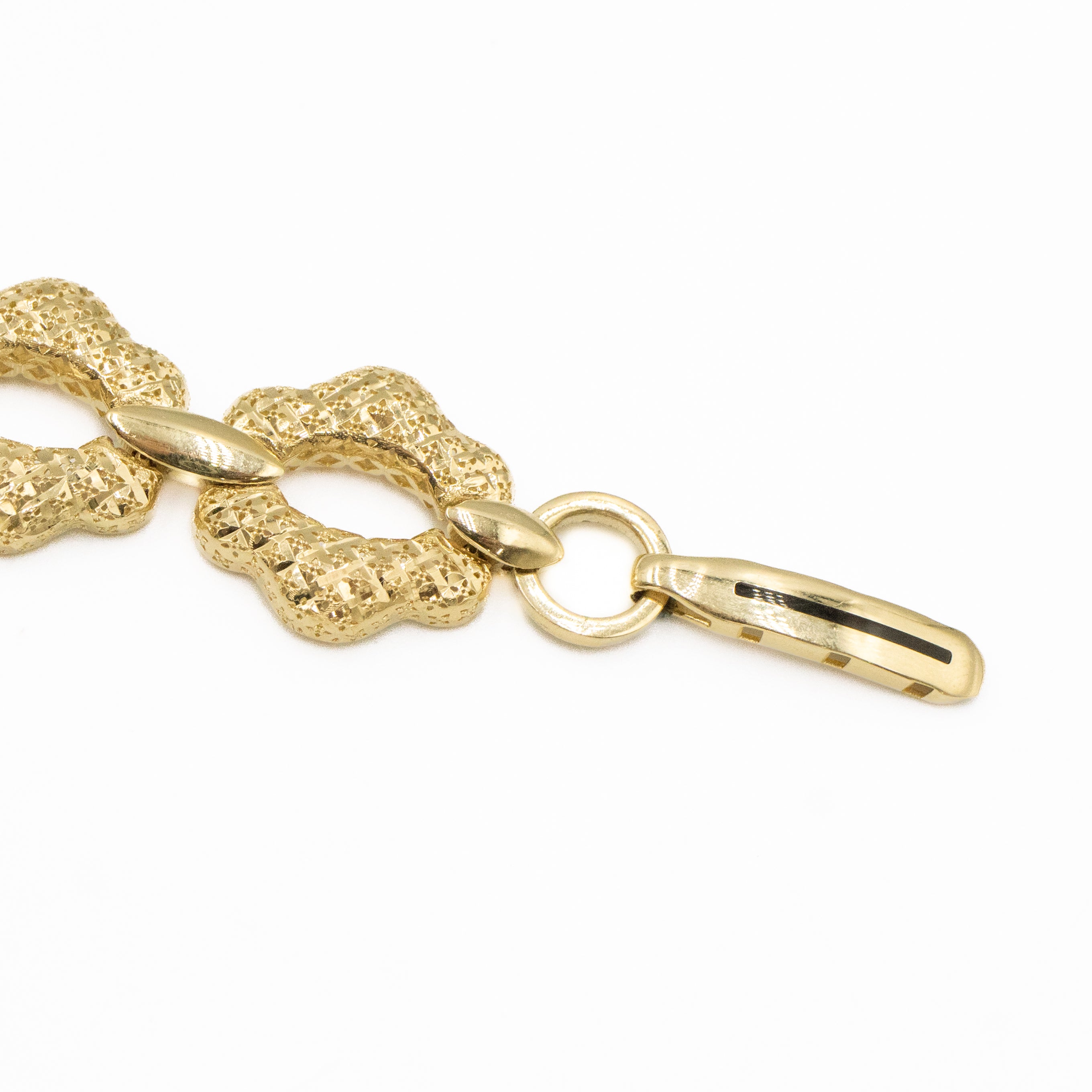 PULSERA MONACO TEJIDO FLOR DIAMANTADA HUECO ORO 14K