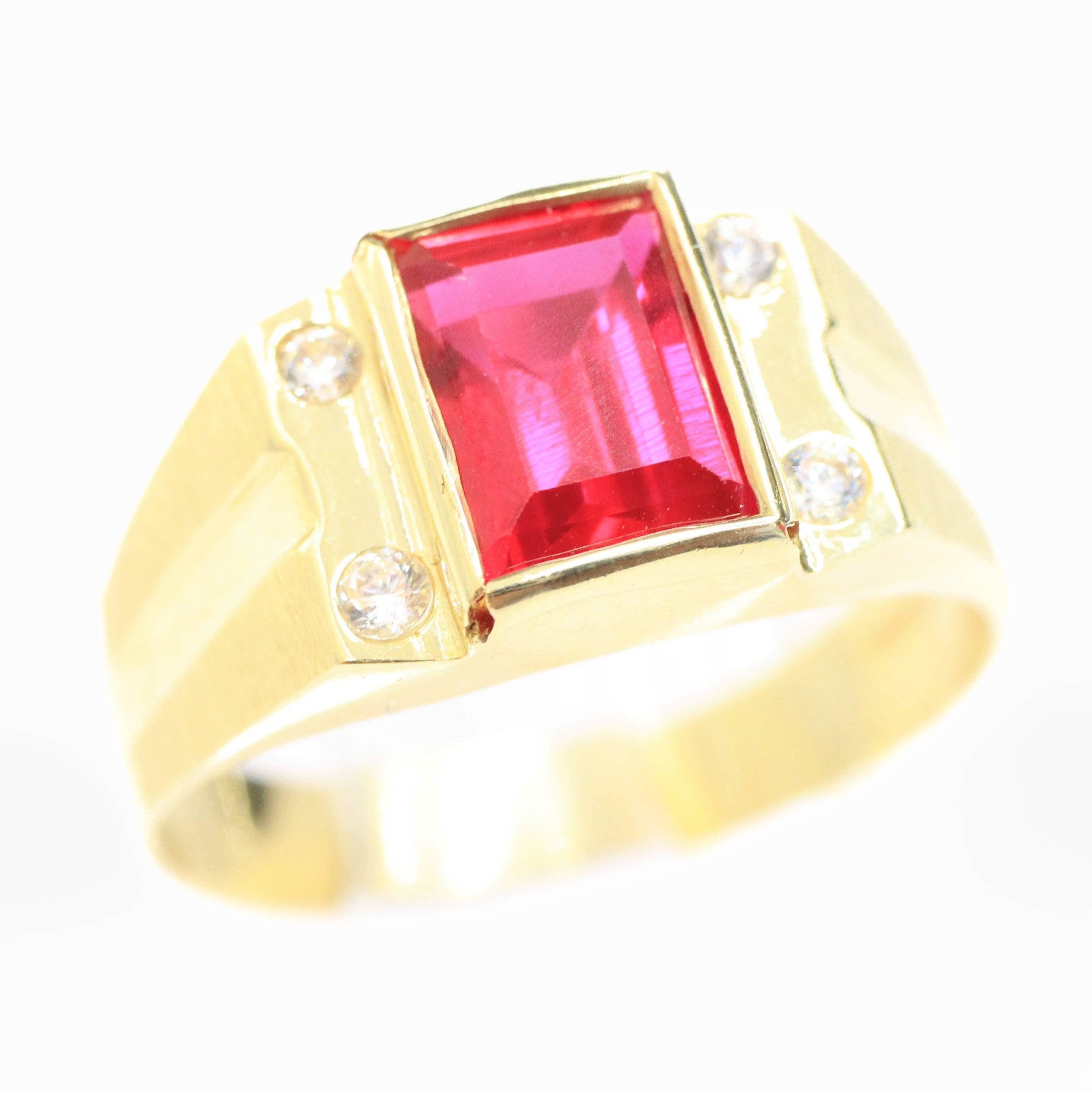 http://www.orovelscollection.com/cdn/shop/products/anillo-con-piedra-zirconia-roja-oro-14k-orovel-s-collection-1_4aa88575-e1b8-4ba7-9f43-beb6a41e7b3d.jpg?v=1681156357