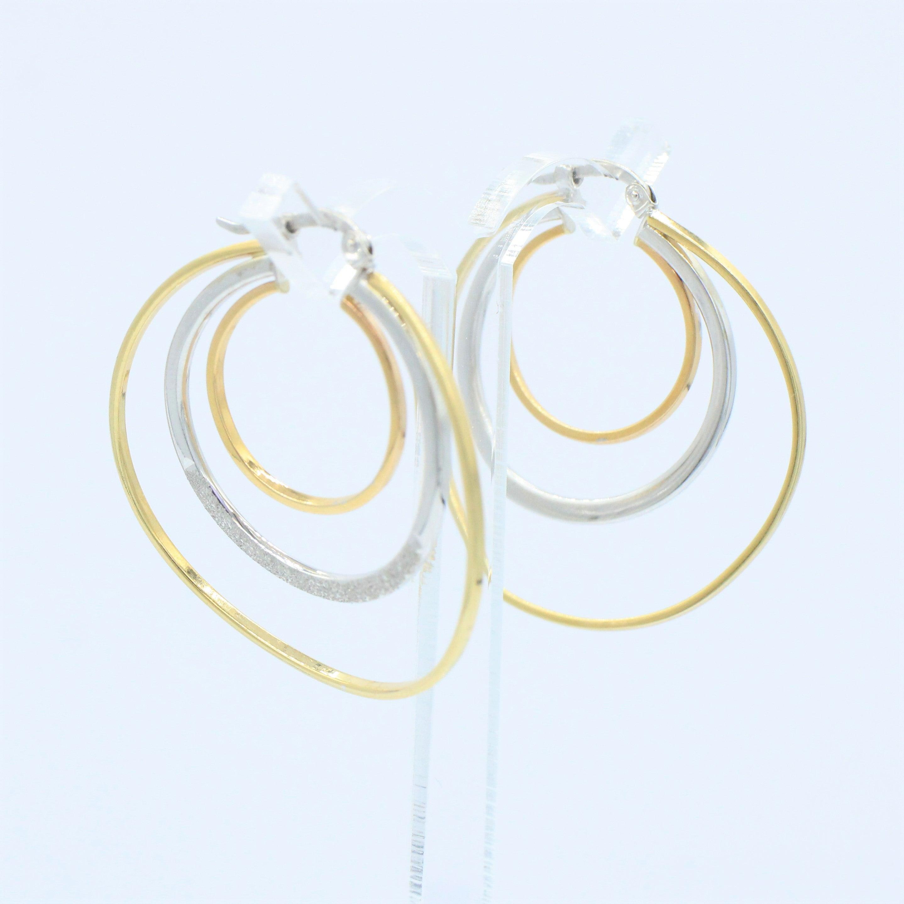 Arracadas oro blanco y amarillo hueca 14k - Orovel's Collection