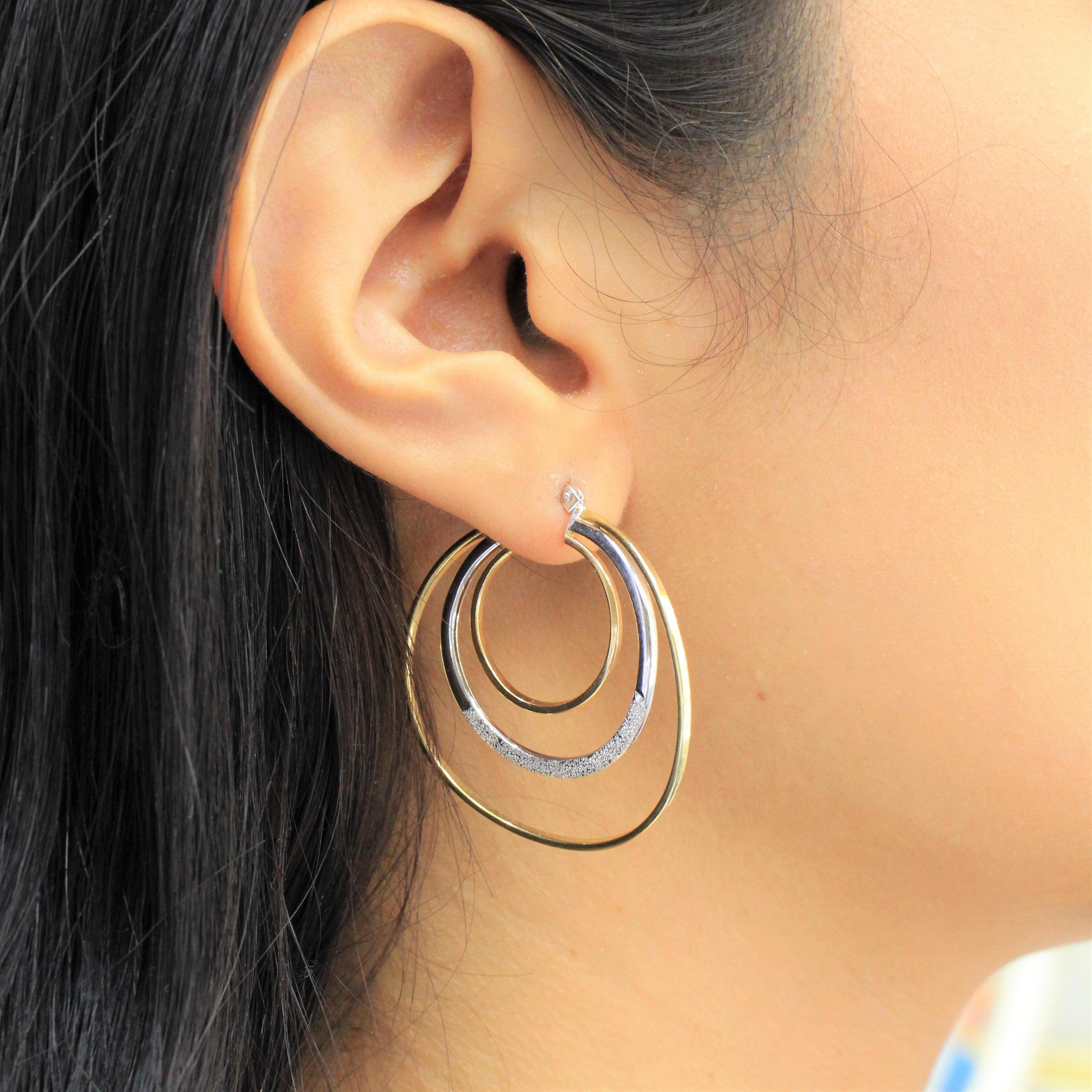 Arracadas oro blanco y amarillo hueca 14k - Orovel's Collection