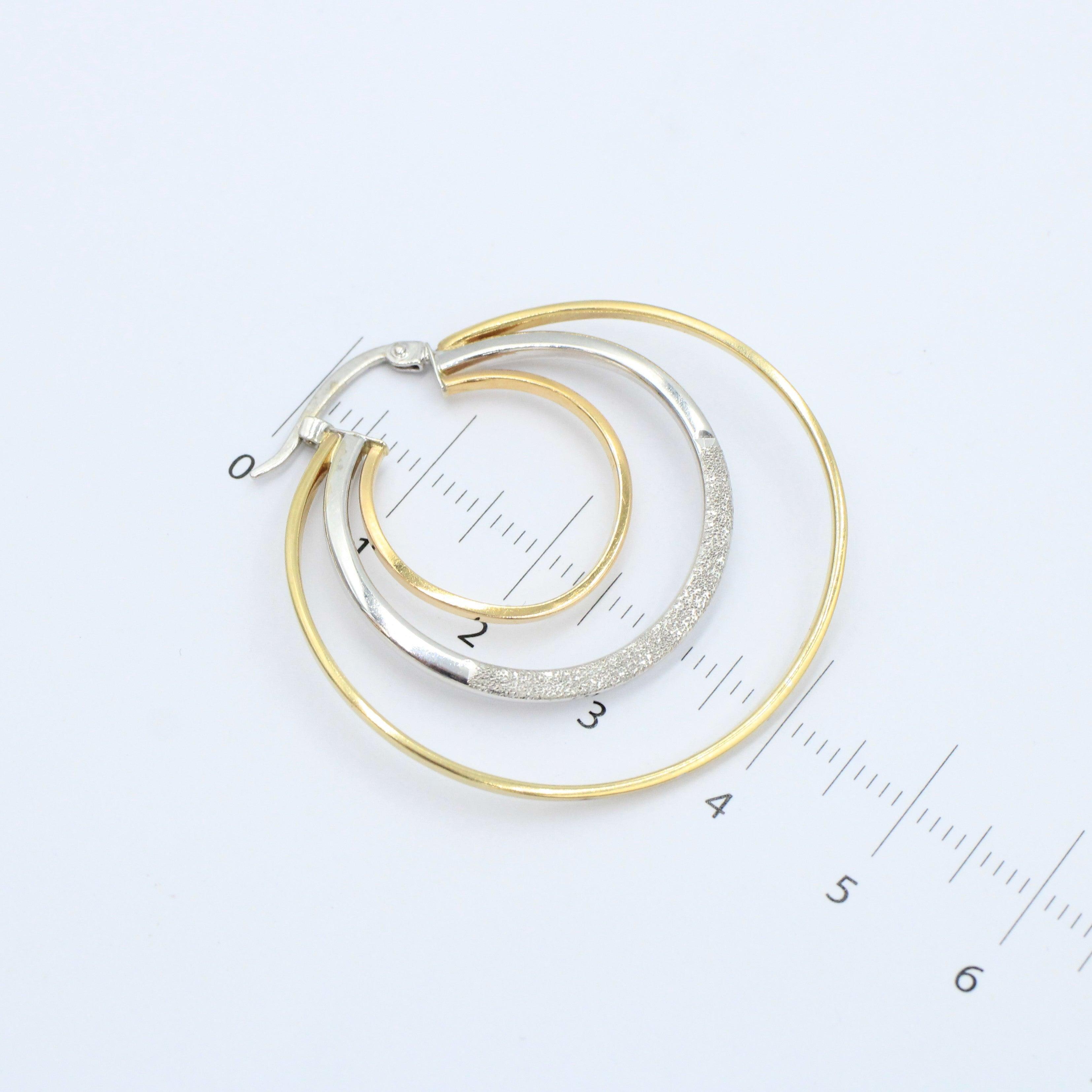 Arracadas oro blanco y amarillo hueca 14k - Orovel's Collection