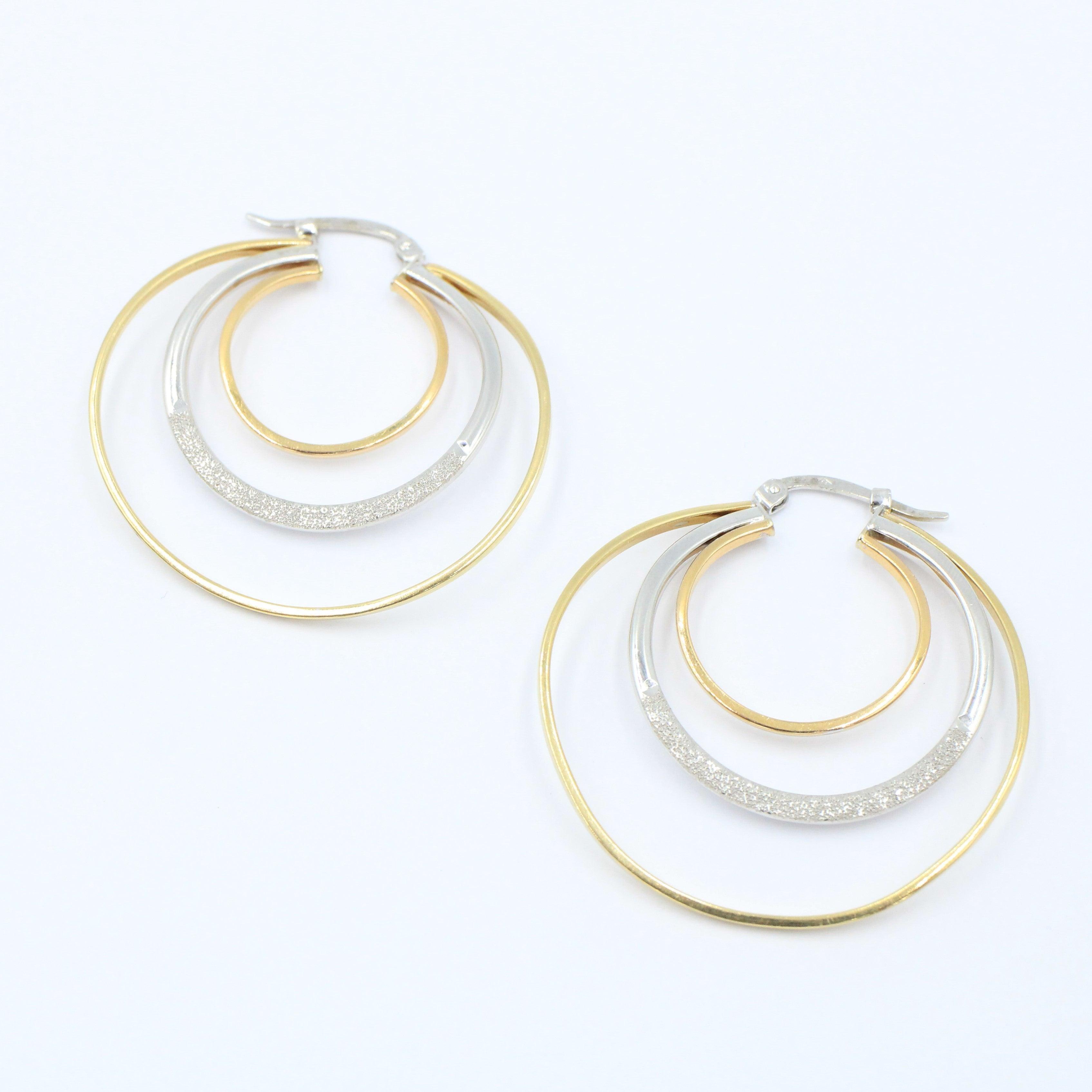 Arracadas oro blanco y amarillo hueca 14k - Orovel's Collection