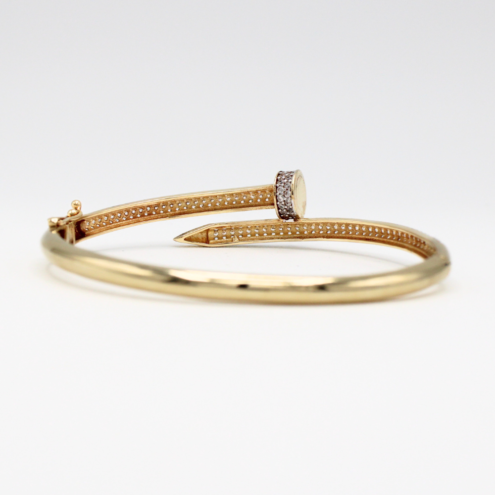 ARO CLAVO CON ZIRCONIAS ORO 14K
