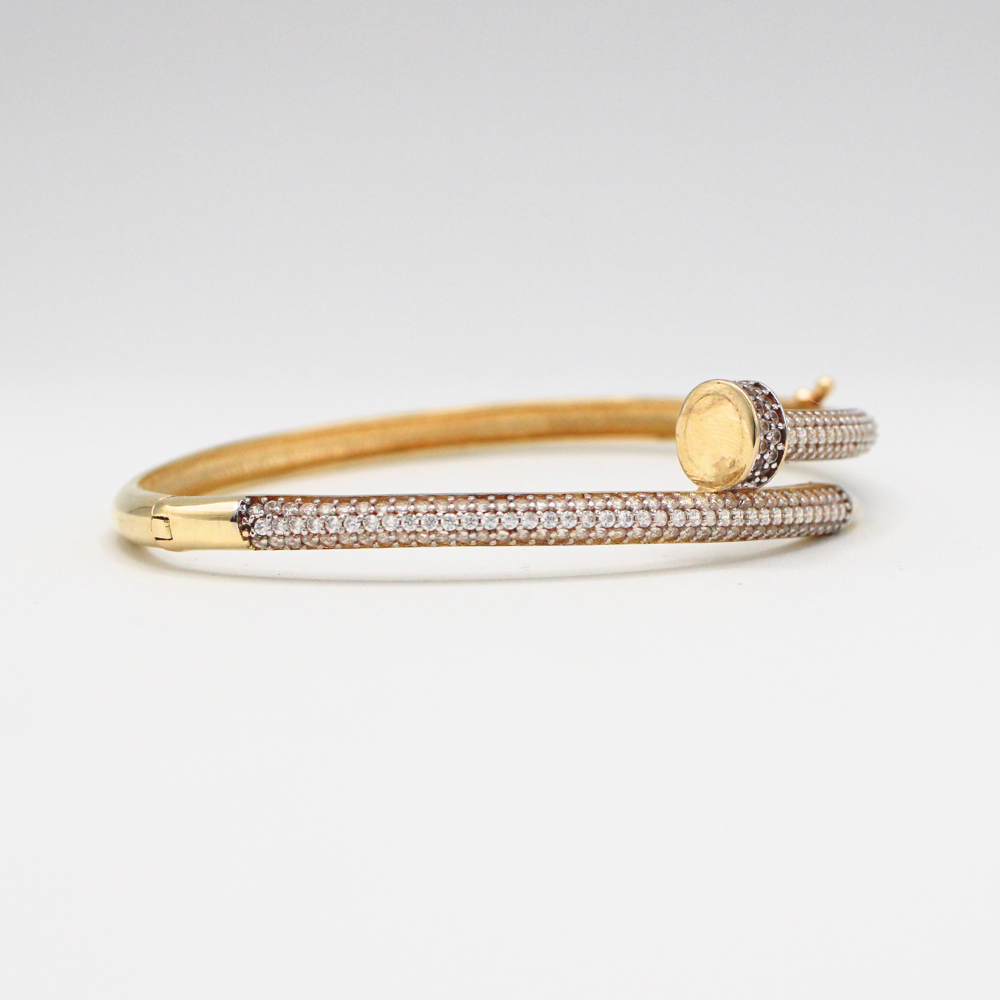 ARO CLAVO CON ZIRCONIAS ORO 14K