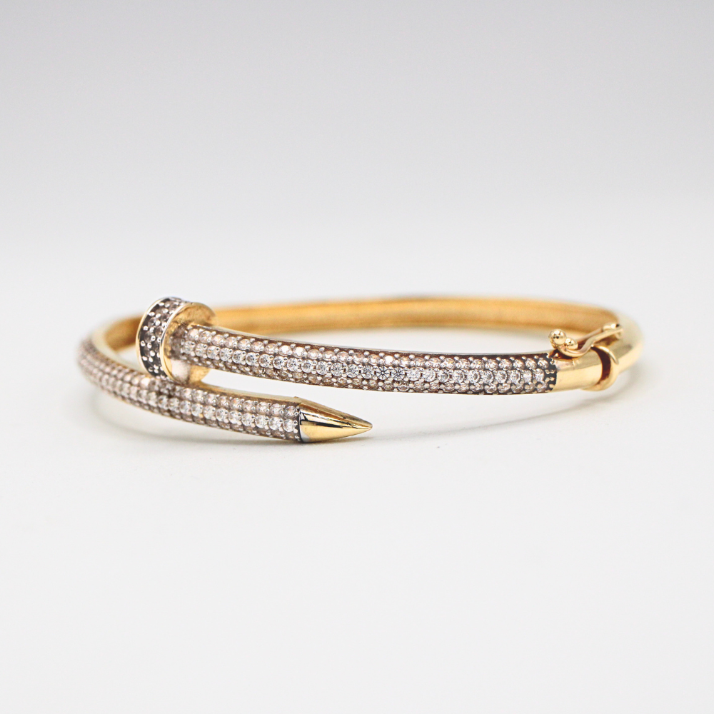 ARO CLAVO CON ZIRCONIAS ORO 14K