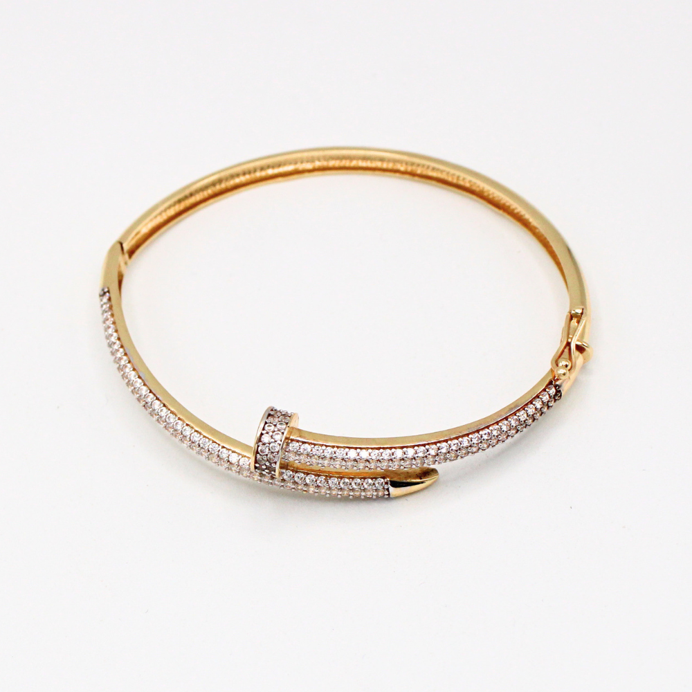 ARO CLAVO CON ZIRCONIAS ORO 14K