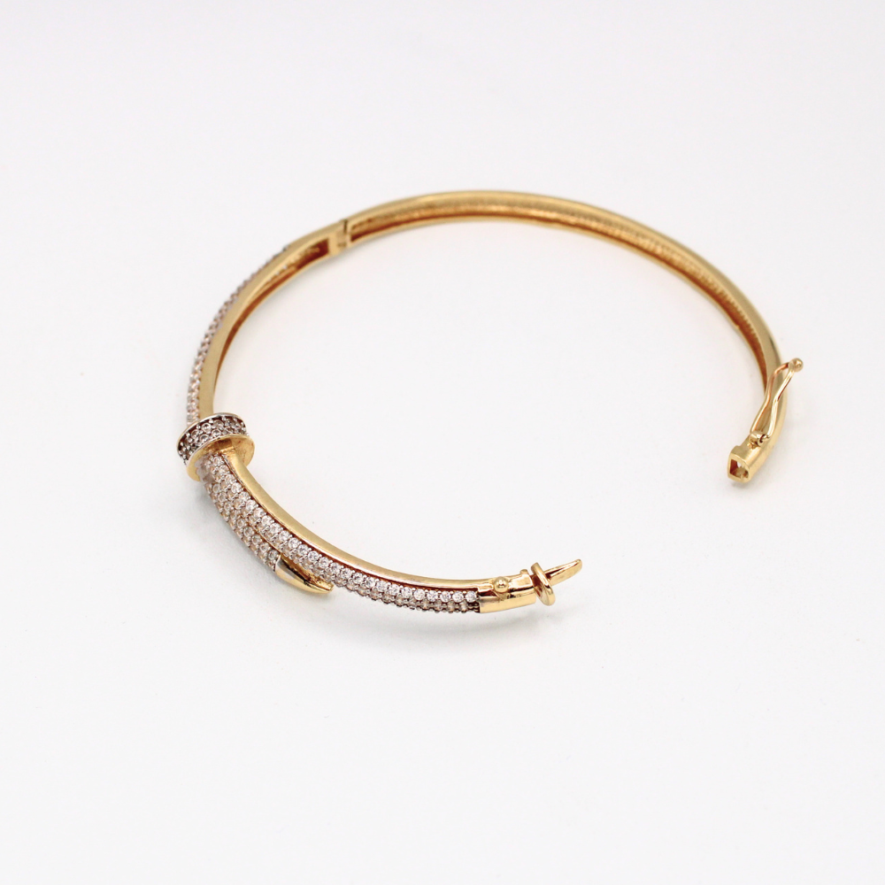 ARO CLAVO CON ZIRCONIAS ORO 14K