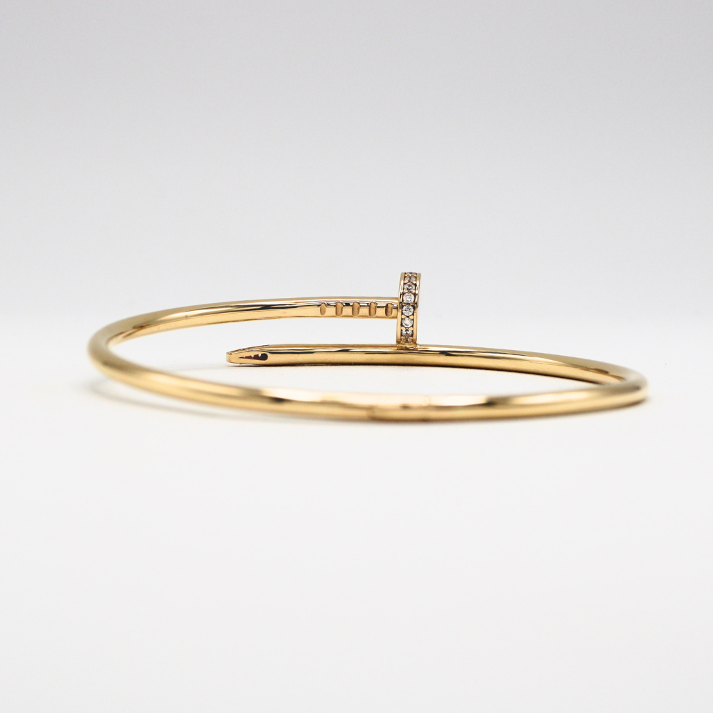 ARO CLAVO MAISO CON ZIRCONIAS ORO 14K