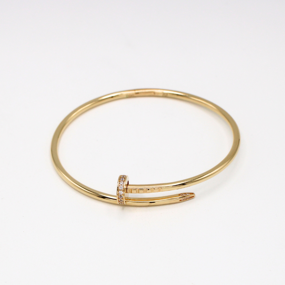 ARO CLAVO MAISO CON ZIRCONIAS ORO 14K