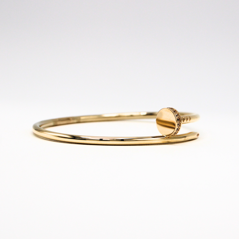 ARO CLAVO MAISO CON ZIRCONIAS ORO 14K
