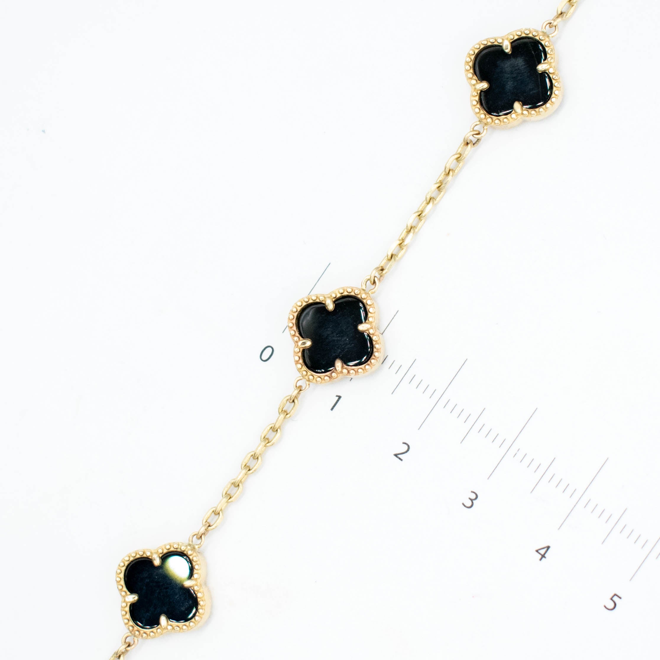 PULSERA MARCA DE DISEÑAOR TREBOL ORO 14K