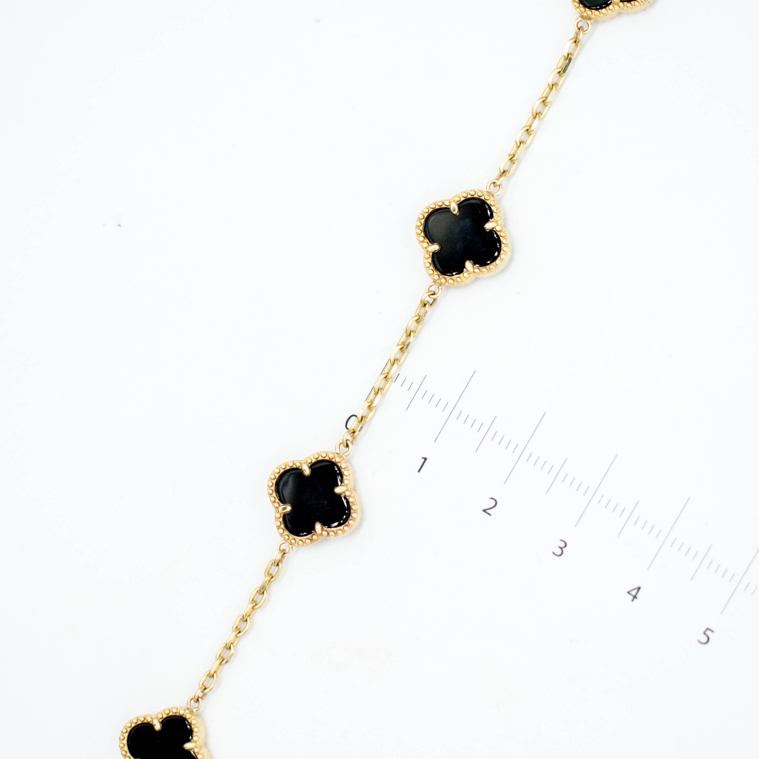 PULSERA MARCA DE DISEÑAOR TREBOL ORO 14K