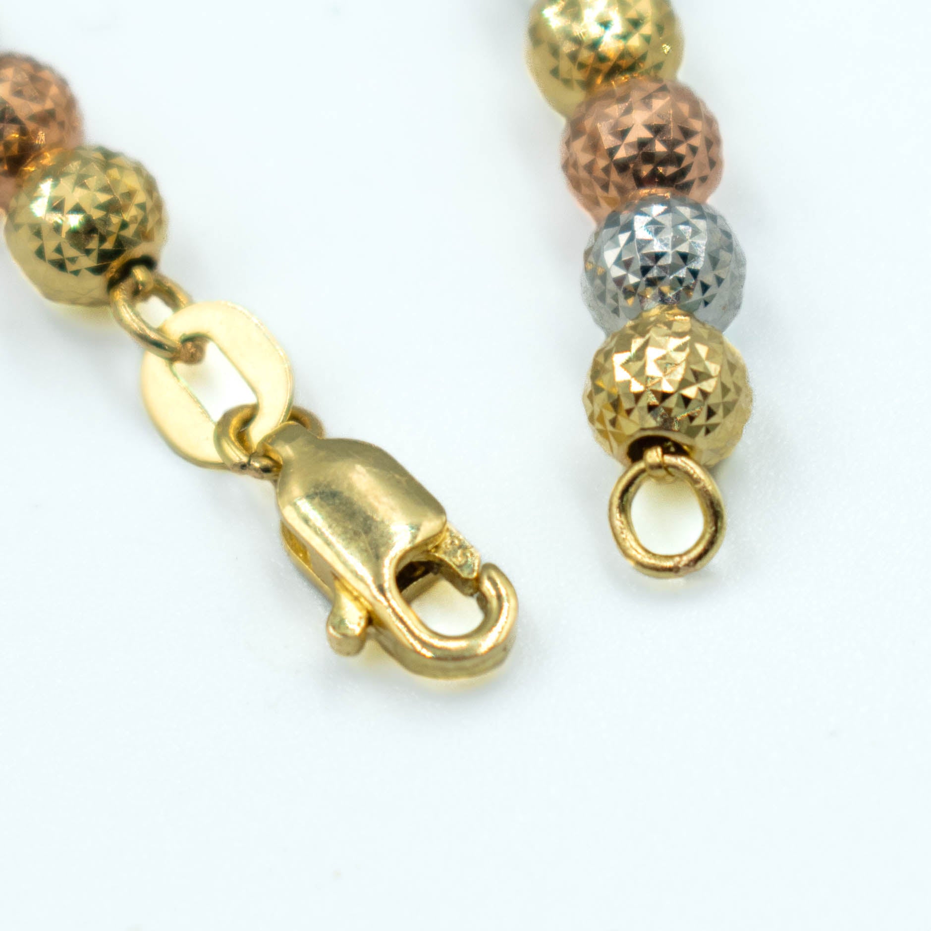 PULSERA  CON BOLAS DIAMANTADAS TRES ORO 14K