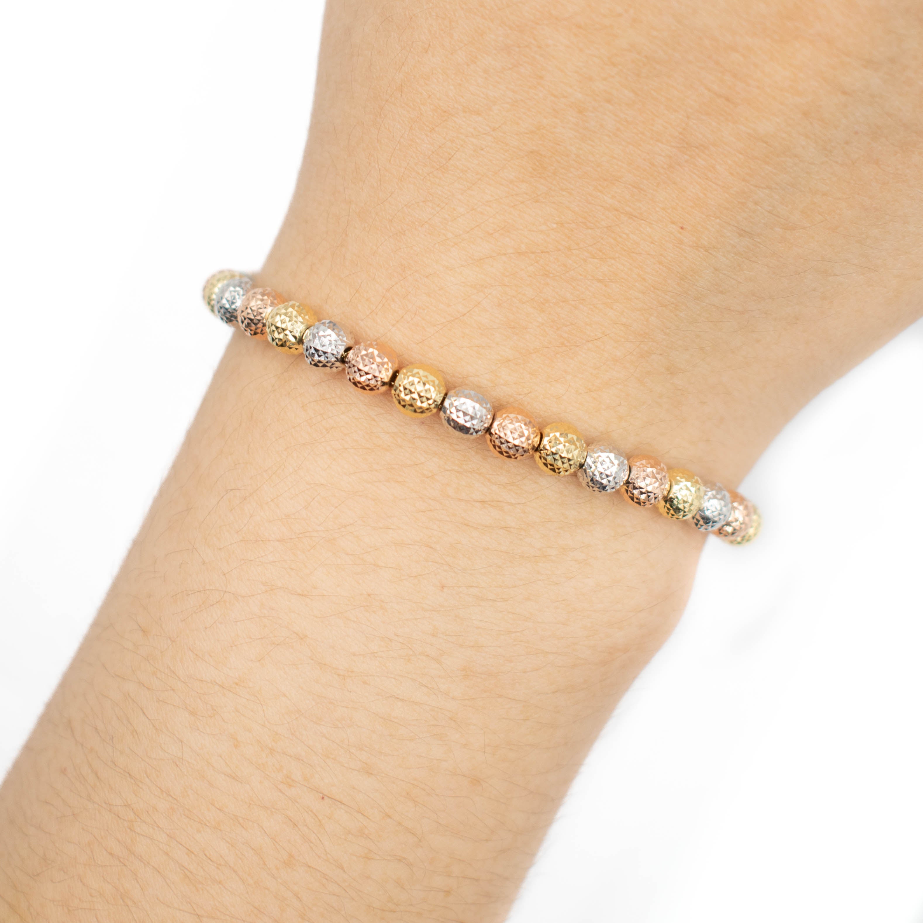 PULSERA  CON BOLAS DIAMANTADAS TRES ORO 14K