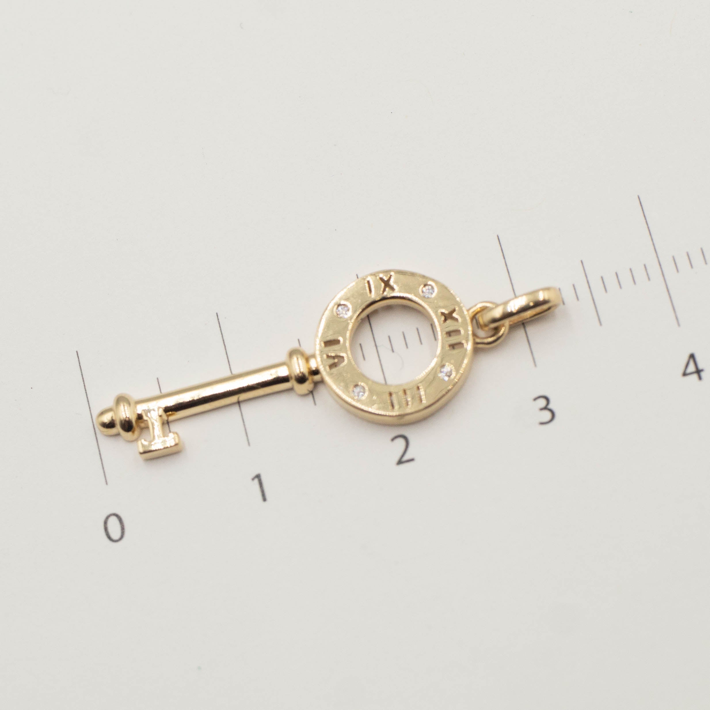DIJE LLAVE HUECA ORO 14K
