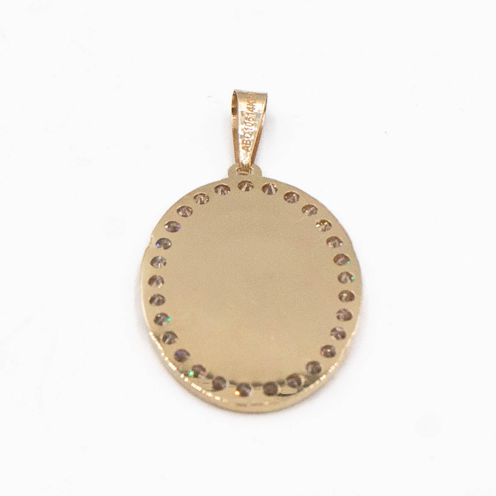 MEDALLA OVALO PIEDRA ZIRCONIA DE SAGRADO CORAZON HUECO ORO 14K