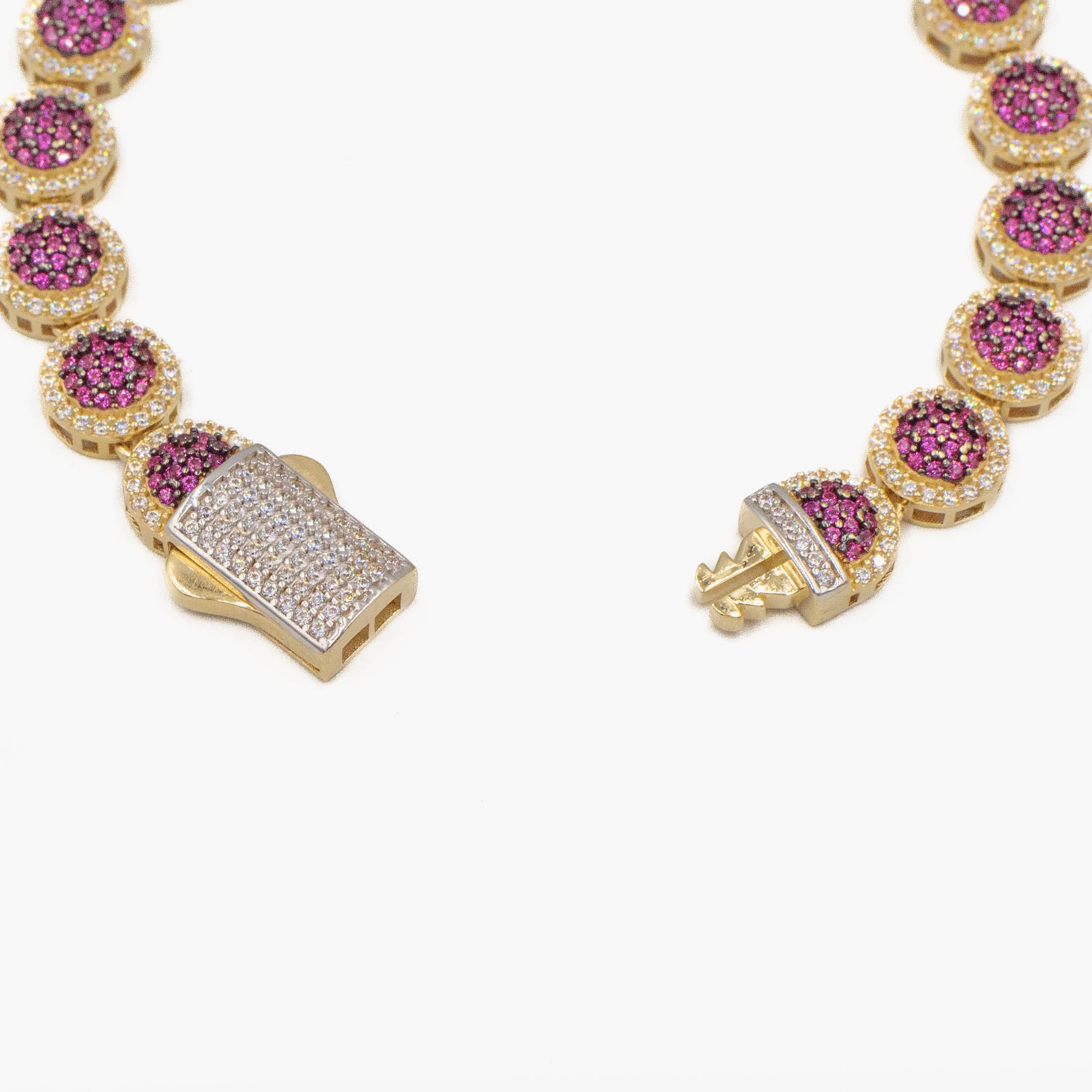 PULSO CON PIEDRAS ZIRCONIAS MORADAS ORO 14K