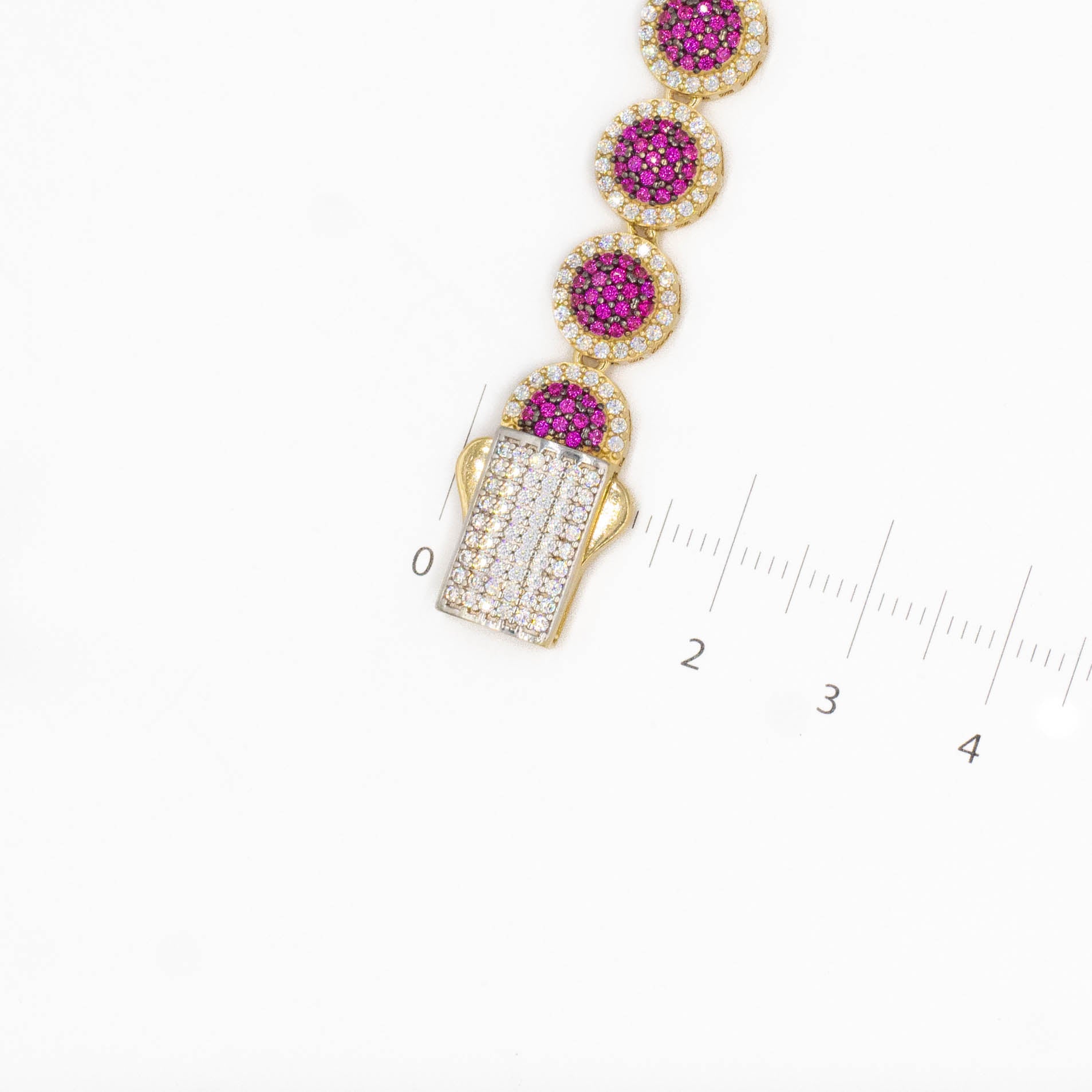 PULSO CON PIEDRAS ZIRCONIAS MORADAS ORO 14K